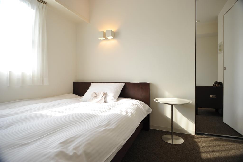 7 Days Hotel Plus Kōchi Pokoj fotografie
