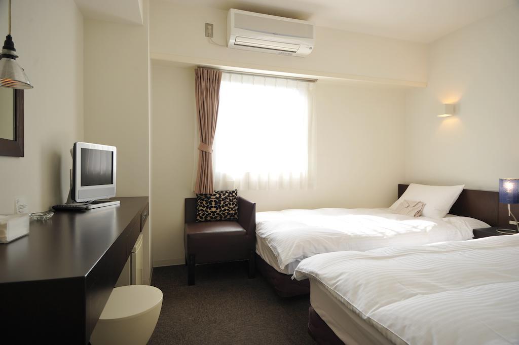 7 Days Hotel Plus Kōchi Pokoj fotografie